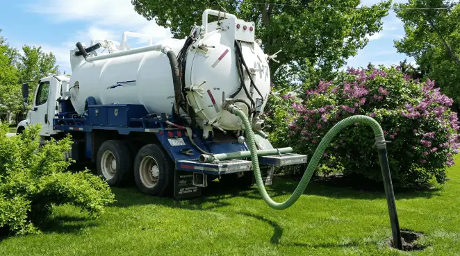 Professional vacuum truck performing residential drainage and septic maintenance in Henderson, NV